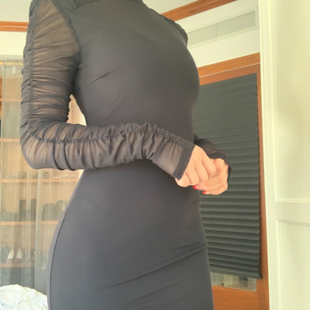 Mini turtleneck padded shoulder black dress